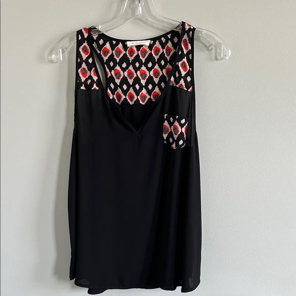 Chic Black Sleeveless Blouse with Geometric Accents - Picture 1 of 5